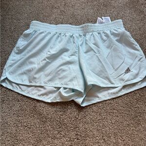 Woman adidas size medium shorts 3 inches